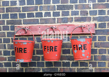 World war 11 Fire station, Red fire buckets filled with sand Stock Photo