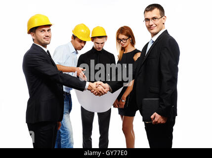 Business people shaking hands, finishing up a meeting. Studio shot Stock Photo