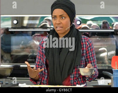 Liverpool, UK. 17th Sept, 2016. The Great British Bake Off Winner 2015, Nadiya Hussain, was at Sefton Park in Liverpool on Saturday, 17 September to give a celebrity food demonstration in a large marquee. She entertained the large audience with her cooking and story telling at the Food and Drink Festival. Credit:  Pak Hung Chan/Alamy Live News Stock Photo