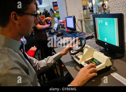 Vancouver, Museum of Vancouver in Canada. 17th Sep, 2016. A resident plays with a video game console manufactured in the early 1980s, at the Museum of Vancouver in Canada, on Sept. 17, 2016. Credit:  Liang Sen/Xinhua/Alamy Live News Stock Photo