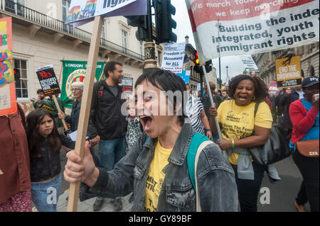 London, UK. 17th September 2016. Movement for Justice supporters march with their banner to Parliament Square in solidarity with refugees, calling on the government to respond the the huge feeling among the British people, 80% of whom have said we should be welcoming more refugees here. The protest was supported by over 40 organisations, including major charities, faith organisations and activists. Peter Marshall/Alamy Live News Stock Photo