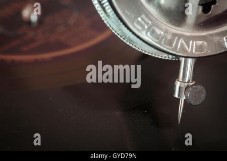 Closeup of a  turntable needle from a vintage phonograph Stock Photo