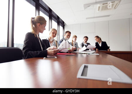 Business analytical team working at meeting with financial documents Stock Photo