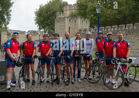 Ambassador for the Blue Marine Foundation Simon Le Bon (fifth right) poses with cyclists at the start of the Blue Marine Foundation London to Monaco Bike Challenge, at The Tower of London, where over 50 cyclists begin the 1500 km in aid of ocean conservation. Stock Photo