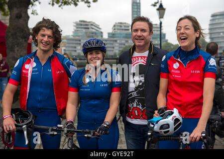 Ambassador for the Blue Marine Foundation Simon Le Bon (second right) poses with cyclists at the start of the Blue Marine Foundation London to Monaco Bike Challenge, at The Tower of London, where over 50 cyclists begin the 1500 km in aid of ocean conservation. Stock Photo