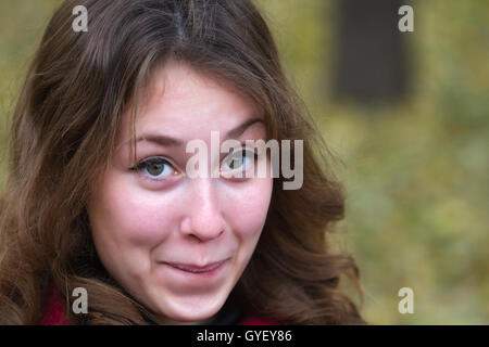 Portrait of an attractive beautiful pretty cute young caucasian embarassed astonished woman (girl, female, person, model) Stock Photo