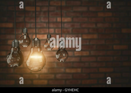 teamwork concept Vintage bulbs on brick wall background, copy space for text,3d rendering Stock Photo