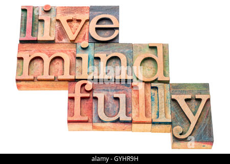 live mindfully - isolated word abstract in letterpress wood type Stock Photo