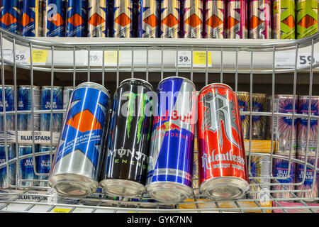 Energy drinks in shopping trolley in Tesco supermarket. UK Stock Photo