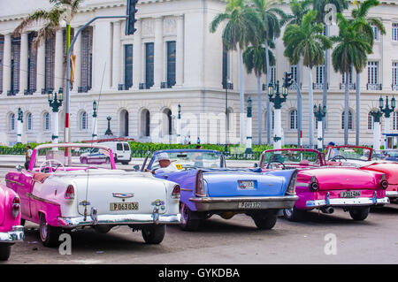 Old classic American cars on one of Havana's streets Stock Photo