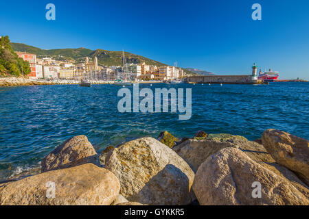 View to old city center of Bastia town with Joannis Babtistes Cathedral and boats in port, France, Europe. Stock Photo