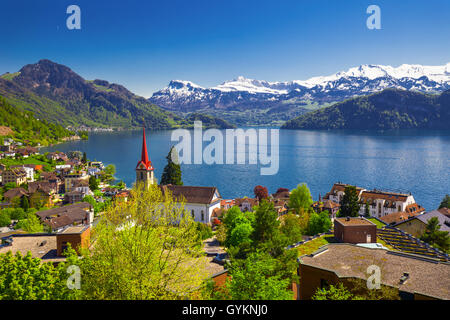 Panorama image of village Weggis, lake Lucerne (Vierwaldstatersee), Pilatus mountain and Swiss Alps in the background near famou Stock Photo