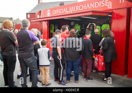 queues of fans at official merchandise stall at Liverpool FC anfield stadium Liverpool Merseyside UK Stock Photo