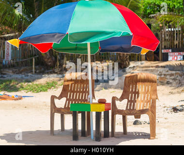 Colourful painted wooden outdoor table and chairs Stock 