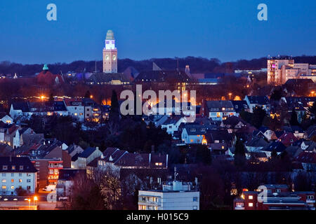 cityscape of Buer with town hall tower in twilight, Germany, North Rhine-Westphalia, Ruhr Area, Gelsenkirchen Stock Photo