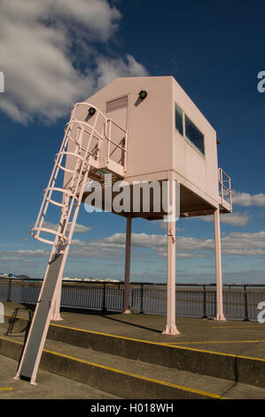 The distinctive pink yachtmaster hut on the Cardiff Bay Barrage breakwater was originally designed for local yacht clubs. Stock Photo