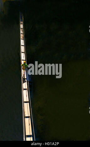 climber on simple suspension bridge, Via Ferrata du Grand Vallon ValfrÚjus, France, Savoie Stock Photo