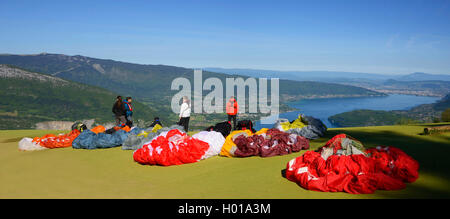 paragliders ready for take off over the Lake Annecy, France Stock Photo