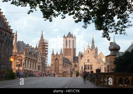 cathedral niklaaskerk in the old belgium town of ghent with tram rails in foreground seen from michielsbrug