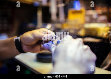 Inhaling dust particles flying around during work may be dangerous Stock Photo