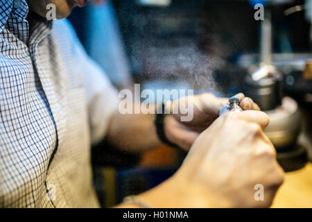 Inhaling dust particles flying around during work may be dangerous Stock Photo