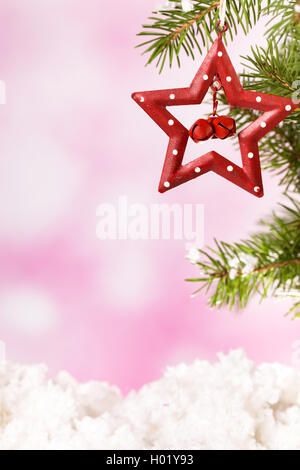 Vintage red star from right side of pink bokeh background Stock Photo