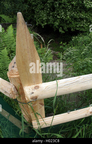 wooden fence with endangering cusp, Germany Stock Photo