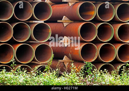 storage of iron pipes in an industrial area, Germany Stock Photo