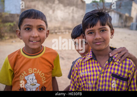GODWAR REGION, INDIA - 12 FEBRUARY 2015: Three boys from Rabari tribe. Loss of tradition gains pace from every new generation. R Stock Photo