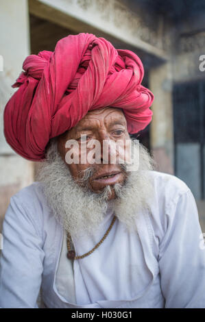 GODWAR REGION, INDIA - 12 FEBRUARY 2015: Elderly Rabari tribesman with traditional turban, clothes and long beard. Rabari or Rew Stock Photo