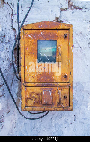 JODHPUR, INDIA - 09 FEBRUARY 2015: Old fusebox on white stone wall. Stock Photo