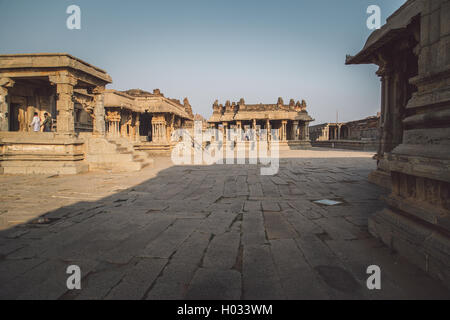 HAMPI, INDIA - 30 JANUARY 2015: Ruins of Hampi are a UNESCO World Heritage Site. Achyutaraya Temple. Post-processed with grain,  Stock Photo