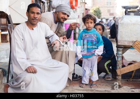 DARAW, EGYPT - FEBRUARY 6, 2016: Local family posing for camera at Daraw market. Stock Photo