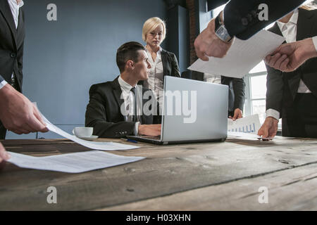 Business man getting extra work deadline concept Stock Photo