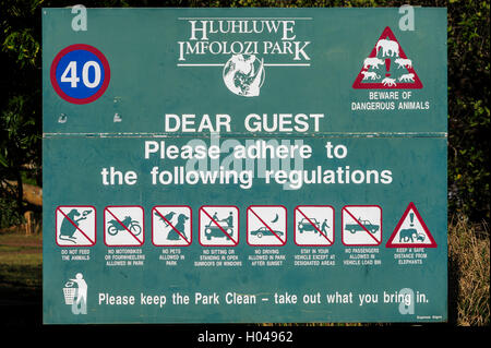 Information board at the entrance of Hluhluwe Imfolozi Park showing the rules and regulations to follow, South Africa Stock Photo