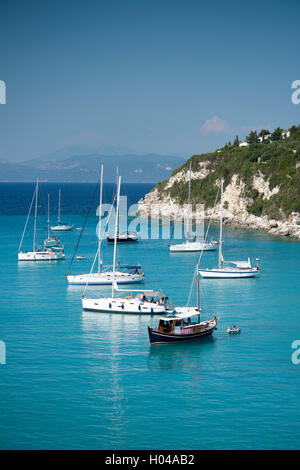 Sailing yachts in Lakka harbour on the island of Paxos, The Ionian Islands, The Greek Islands, Greece, Europe Stock Photo