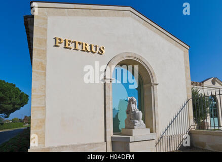 Chateau Petrus winery cellar cave with emblem 'Peter The Apostle Statue' Pomerol Bordeaux Gironde France Stock Photo