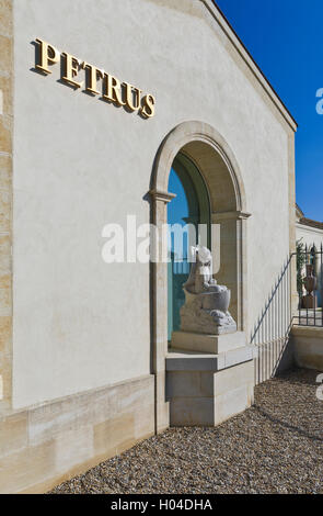 Chateau Petrus winery cellar cave with emblem 'Peter The Apostle Statue' Pomerol Bordeaux Gironde France Stock Photo