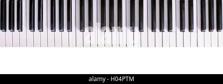 Old piano keyboard isolated on white Stock Photo