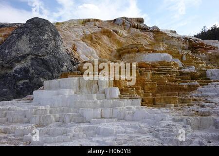 Travertine deposits from hot springs, lower terraces at Mammoth Hot Springs, Yellowstone National Park Stock Photo