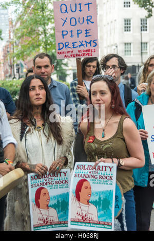 London, UK. 19th September 2016. People stand outside the US Embassy in a non-violent, prayerful act of solidarity with the Standing Rock Sioux Tribe threatened by the construction of a huge oil pipeline close to their reservation in North Dakota and the Missouri River. Credit:  Peter Marshall/Alamy Live News Stock Photo
