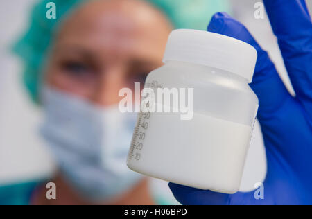 Marita Sponholz, head of the Milchkueche (lit. milk kitchen), checks bottles containing women's milk at the neonatology department of the Kinderklinik (children's clinic) at Greifswald University in Greifswald, Germany, 20 September 2016. The women's milk bank at the children's clinic was opened in 2014.  PHOTO: STEFAN SAUER/DPA Stock Photo