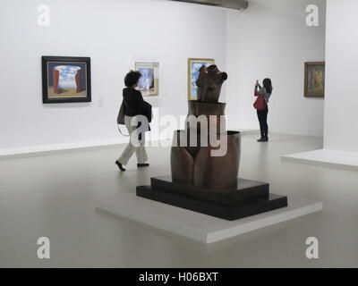 Paris, France. 20th Sep, 2016. Two women walk through the exhibition Magritte. The Treachery of Images in Paris, France, 20 September 2016. The exhibition runs from 21 September 2016 until 23 January 2017. PHOTO: SABINE GLAUBITZ/DPA/Alamy Live News Stock Photo