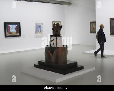 Paris, France. 20th Sep, 2016. A man walks through the exhibition Magritte. The Treachery of Images in Paris, France, 20 September 2016. The exhibition runs from 21 September 2016 until 23 January 2017. PHOTO: SABINE GLAUBITZ/DPA/Alamy Live News Stock Photo