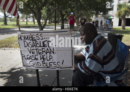 Charleston, SC, USA. 18th Sep, 2016. JAMES JAMISON, 53, sits along a sidewalk near a city park, hoping for donations so he can eat. A U.S. Marine Corps veteran of 12 years and former truck driver, he is now disabled and homeless, waiting for his military pension to begin. ''I can't stay in the one shelter in this town, it's like a prison, '' he said. ''I'd rather take my chances out here, sleeping in the park or wherever I can lay my head. © Robin Rayne Nelson/ZUMA Wire/Alamy Live News Stock Photo