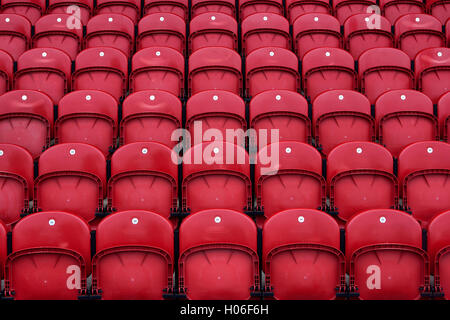 Rows of seats in a sports stadium Stock Photo