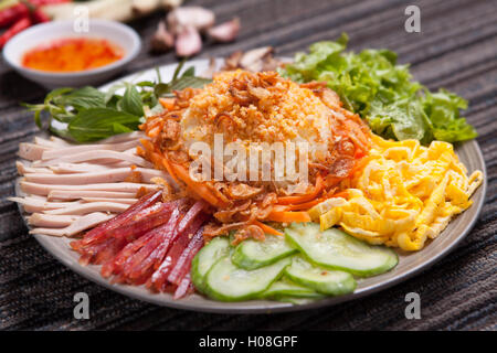 Special Vietnamese royal fried rice with egg, cucumber, salad and pork Stock Photo