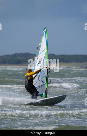Windsurfing at Rhosneigr Beach, Anglesey, Stock Photo
