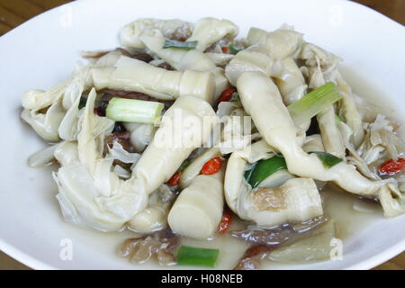 Fried bamboo shoots on white plate Stock Photo