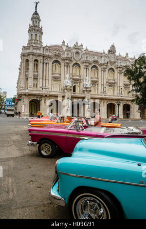 Vintage American cars parked outside the Gran Teatro (Grand Theater), Havana, Cuba, West Indies, Caribbean, Central America Stock Photo